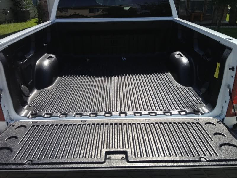 Drop-In vs. Spray-In Truck Bedliners:  Which One is Right for You?